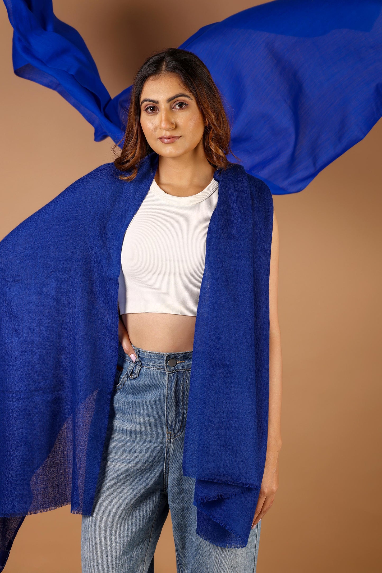 Woman wearing a blue scarf 
