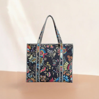 Floral patterned tote bag on a beige background