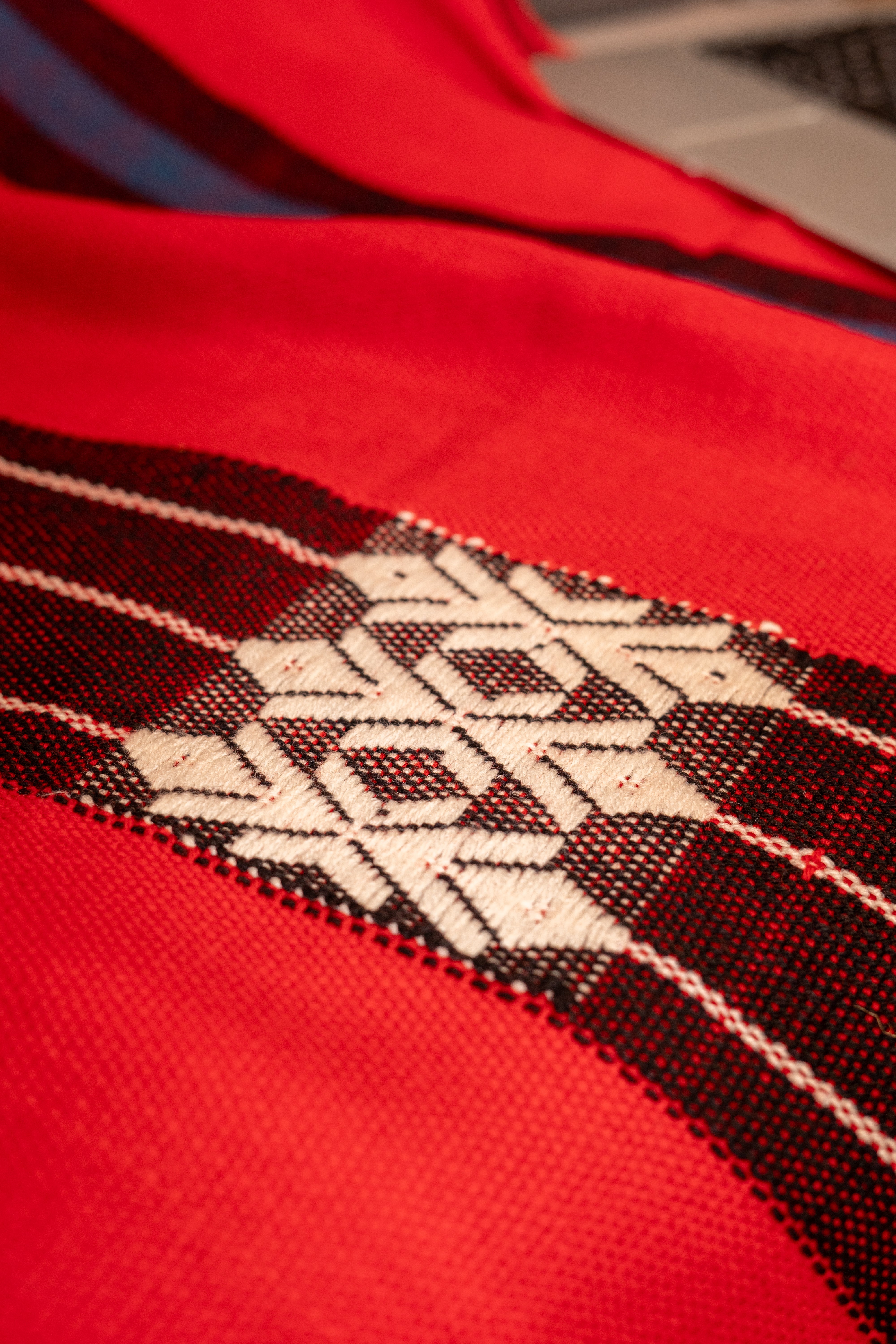 OMVAI Artisanal Patterned Cashmilon Woven Throw Blanket / Comforter - Crimson Red with black white weave