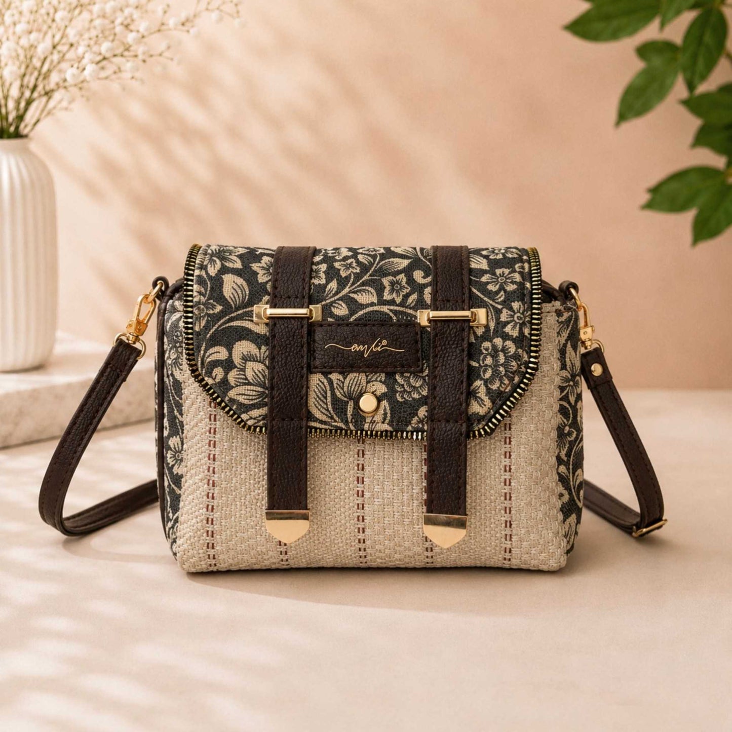 Floral patterned handbag with woven design on a neutral background