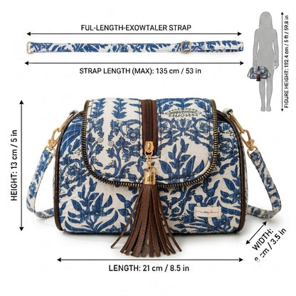 OMVAI Rajputana Bloom quilted cotton sling bag features a blue and white floral print
