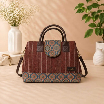 Patterned handbag on a wooden surface with decorative elements