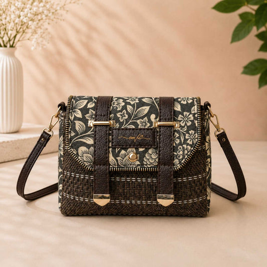 Floral patterned handbag with woven design on a beige surface