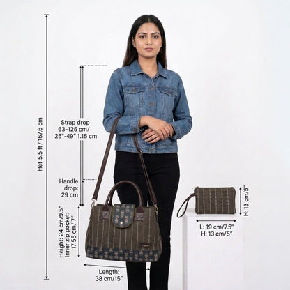 Woman holding a handbag with measurements displayed on a white background