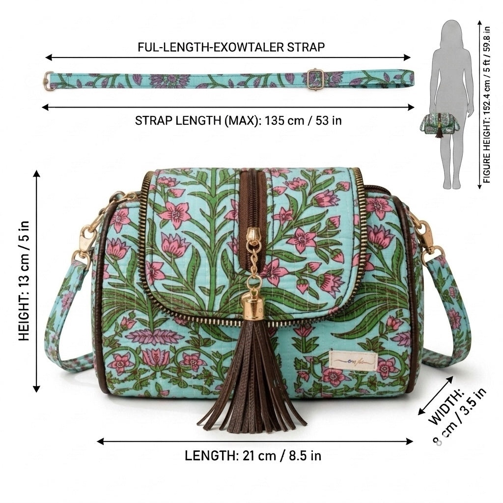 Light blue floral sling bag by OMVAI