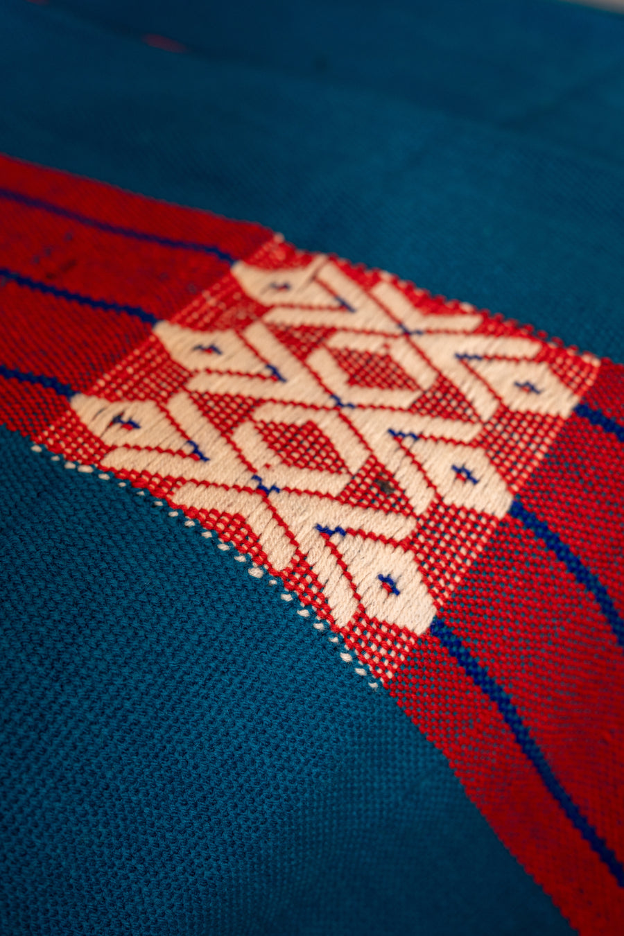OMVAI Artisanal Patterned Cashmilon Woven Throw Blanket / Comforter - Teal with red white weave